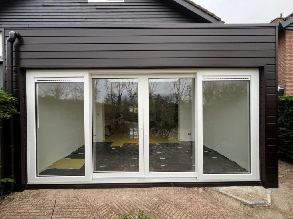 aanbouw rotterdam met grote schuifpui en keralit