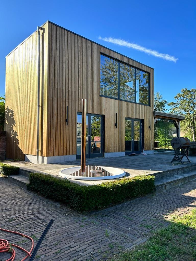 achterkant aanbouw villa