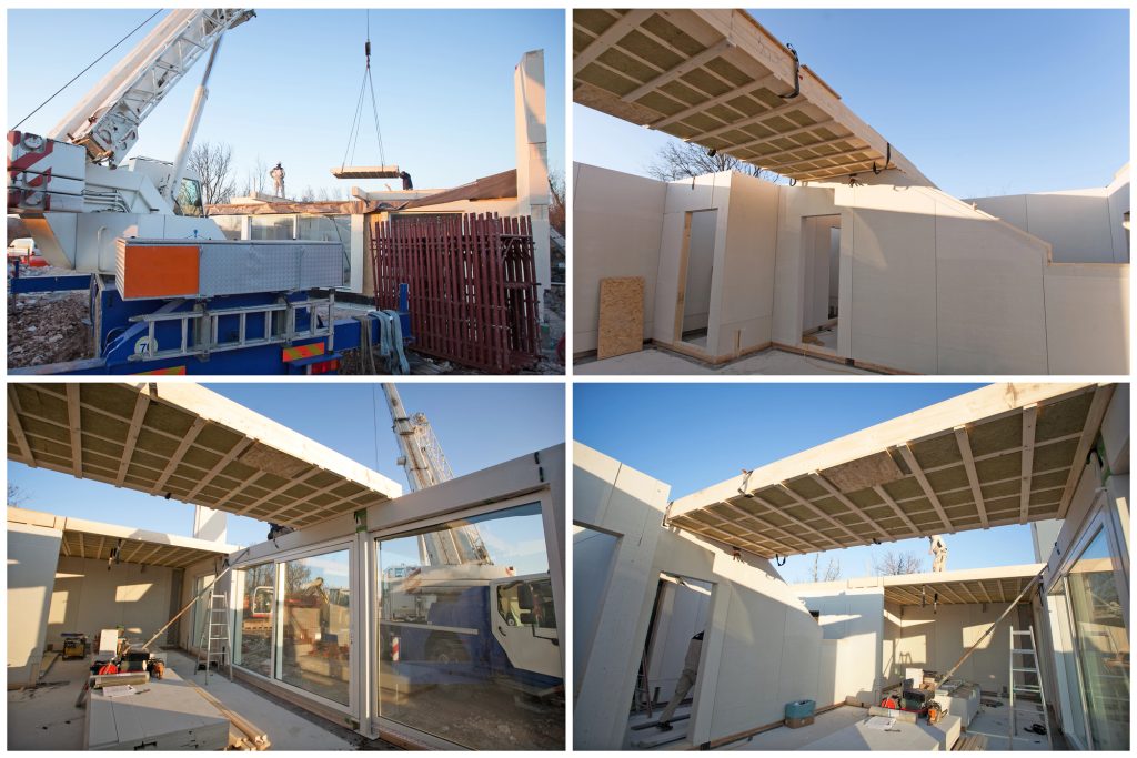 Prefab dakopbouw wordt op plat dak geplaatst met kraan